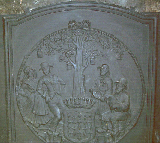 Taque de cheminée avec vielle et chabrette limousine