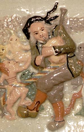 Sonneur de biniou et korrigans
